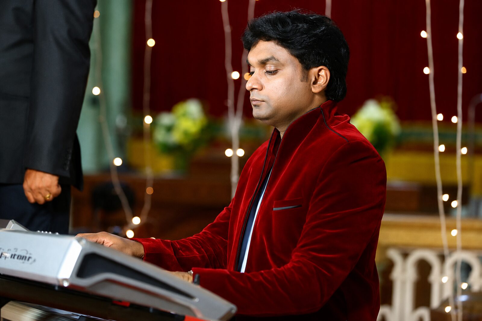 Anil Cheriyan performing at the keyboard